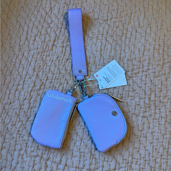 lululemon athletica Handbags - NWT Lululemon Athletica Dual Pouch Wristlet in Lavender Frost/White, Silver